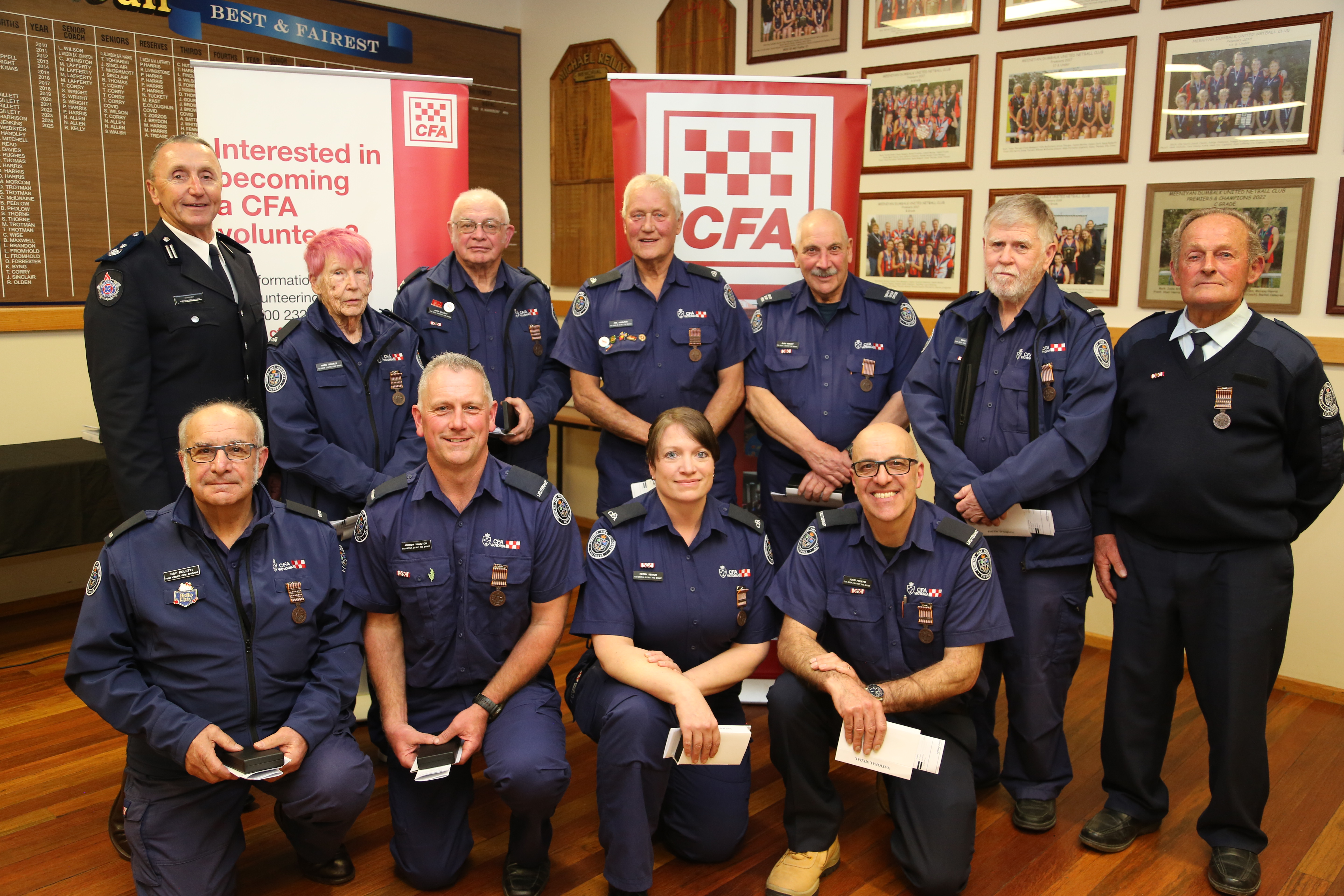 District 9 CFA Commander Andrew McCartney, back left, presented National Award medals to, from back left, Marg Grumley, John Elliot, Neil Hamilton, Alan Wright, Mike O&rsquo;Mara, Geoff Thompson. Front, from left, Ray Poletti, Andrew Hamilton, Kerry Senior